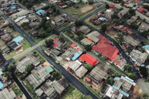 Aerial view showcasing a vibrant residential neighborhood with colorful rooftops.