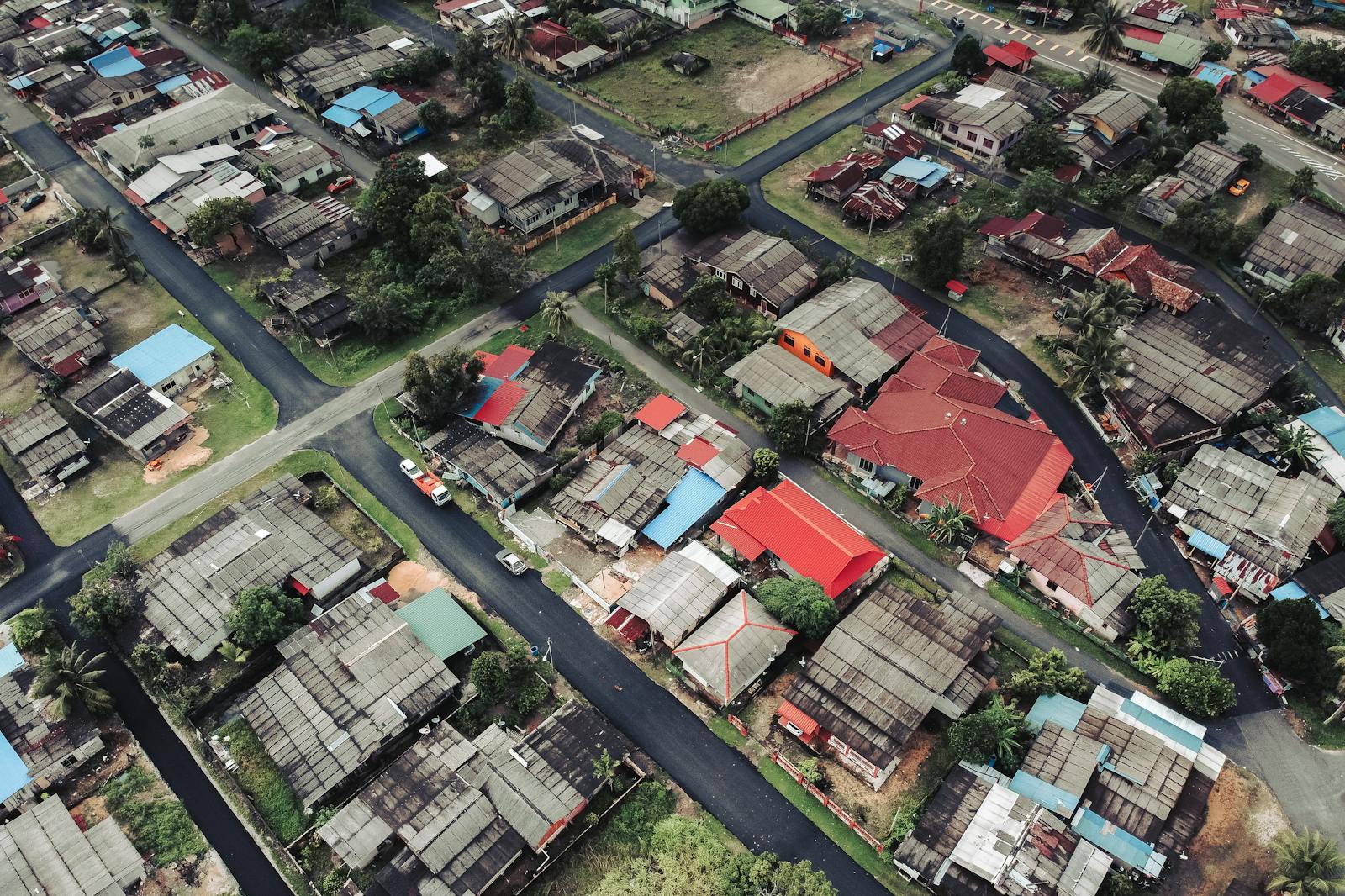 Aerial view showcasing a vibrant residential neighborhood with colorful rooftops.