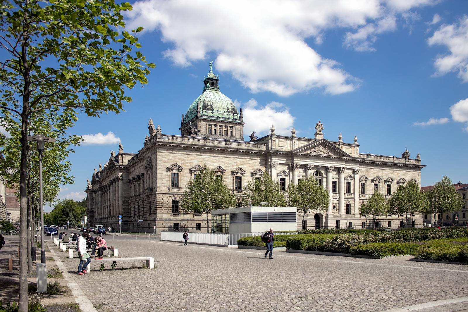 Exterior view of the Federal Administrative Court in Leipzig, Germany with a blue sky.