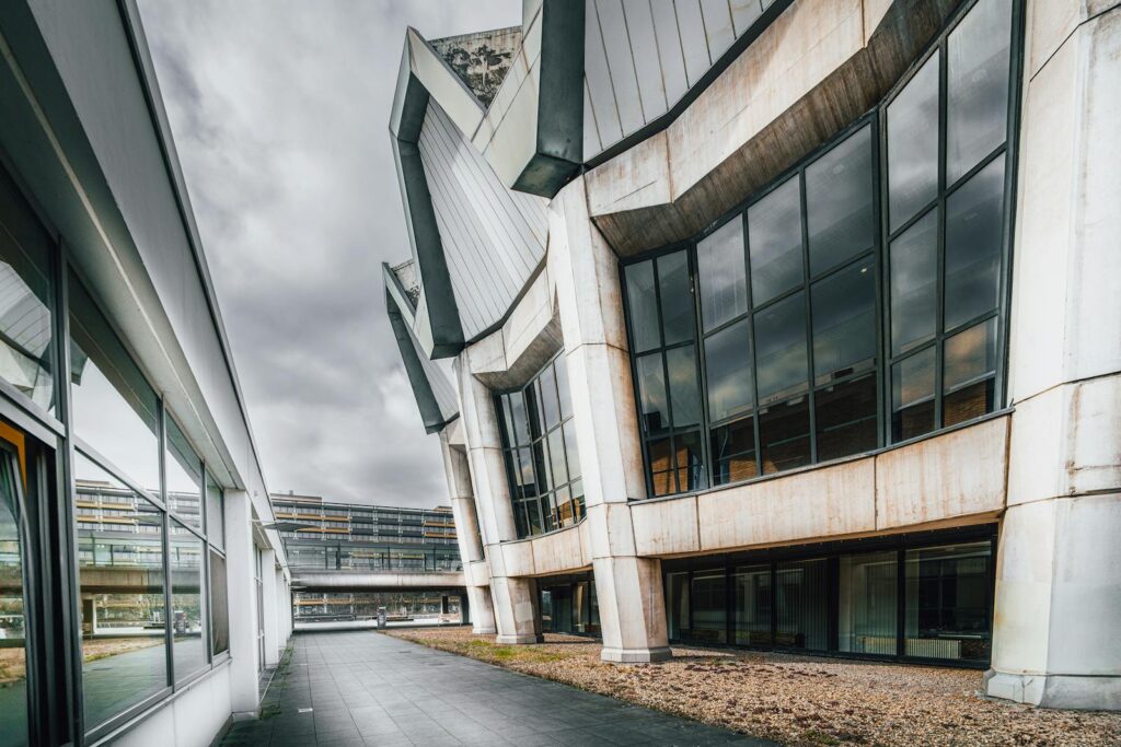 Striking modern architecture showcasing angular concrete and glass design in Bochum, Germany.